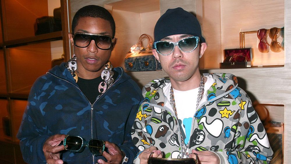 Pharrell Williams and Nigo show off the sunglasses they designed *Exclusive* ***Exclusive*** (Photo by Gregory Pace/FilmMagic)